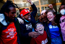 Staten Island-based Amazon.com Inc distribution center union members celebrate after getting the voting results to unionize on Friday, April 1, 2022, in New York. Amazon workers in Staten Island voted to unionize, marking the first successful U.S. organizing effort in the retail giant's history and handing an unexpected win to a nascent group that fueled the union drive.
