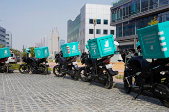 A delivery driver for the app Deliveroo prepares to make a delivery, in Dubai, Sept. 9, 2021.