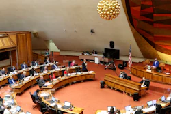 Members of the Hawaii House of Representatives discuss legislation at the State Capitol in Honolulu, May 3, 2022.
