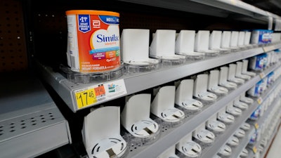 Shelves typically stocked with baby formula sit mostly empty at a store in San Antonio, May 10, 2022.