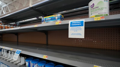 Shelves typically stocked with baby formula sit mostly empty at a store in San Antonio, May 10, 2022.
