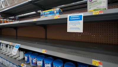 Shelves typically stocked with baby formula sit mostly empty at a store in San Antonio, May 10, 2022.