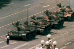 A man blocking a line of tanks on Changan Blvd., Tiananmen Square, Beijing, June 5, 1989.