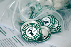 Starbucks union pins on display in Buffalo, N.Y., Dec. 9, 2021.