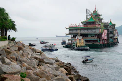 The Jumbo Floating Restaurant is towed away in Hong Kong, June 14, 2022.