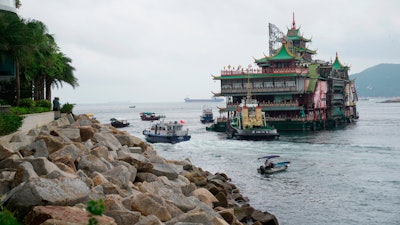 The Jumbo Floating Restaurant is towed away, Hong Kong, June 14, 2022.