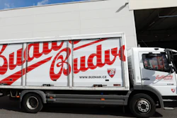 A truck drives past cases of beer at the Budejovicky Budvar brewery in Ceske Budejovice, Czech Republic, March 11, 2019.