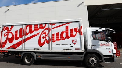 A truck drives past cases of beer at the Budejovicky Budvar brewery in Ceske Budejovice, Czech Republic, March 11, 2019.