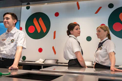 Staff members wait for visitors at a newly opened fast food restaurant in a former McDonald's outlet, Moscow, June 12, 2022.