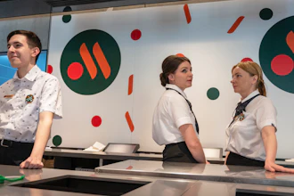 Staff members wait for visitors at a newly opened fast food restaurant in a former McDonald's outlet, Moscow, June 12, 2022.