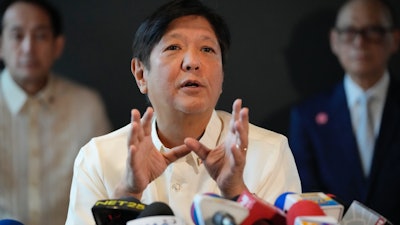 Philippine President-elect Ferdinand 'Bongbong' Marcos Jr. gestures during a press conference at his headquarters in Mandaluyong, Philippines, June 20, 2022.