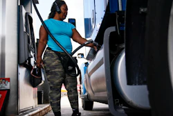Delores Bledsoe of Houston, Texas, fuels up her rig at a truck stop in Carlisle, Pa., July 13, 2022.