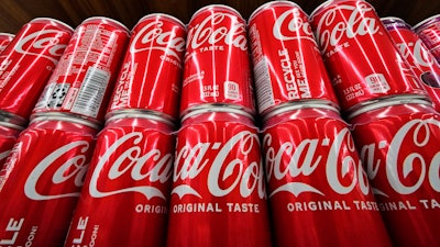 Cans of Coca-Cola on display at a grocery store, Uniontown, Pa., April 24, 2022.