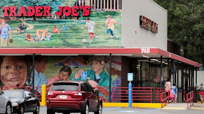 Customers walk to a Trader Joe's market, Aug. 13, 2019, Cambridge, Mass.