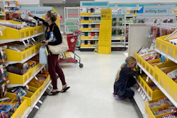 A parent shops for school supplies deals at a Target store, July 27, 2022, North Miami, Fla.