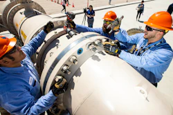 Southern Nevada Water Authority maintenance mechanics, from left, Jason Dondoy, Patrick Smith and Tony Mercado install a spacer flange after removing an energy dissipator at the Low Lake Level Pumping Station (L3P3) at Lake Mead National Recreation Area on April 27, 2022, outside of Las Vegas.