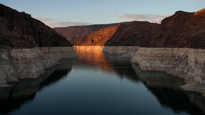 A ring of light minerals shows the high water line of Lake Mead near Boulder City, Nev., June 26, 2022.