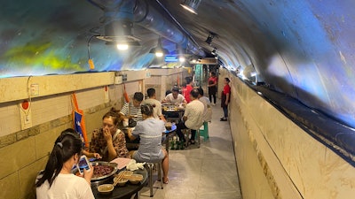 Hotpot restaurant in a converted WWII-era air raid shelter, Chongqing, China, Aug. 20, 2022.