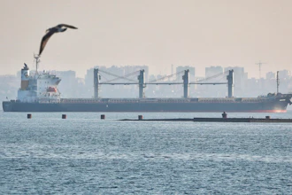The ship Navi-Star carrying a load of corn starts its way from the port in Odesa, Ukraine, Friday, Aug. 5, 2022. Ukraine is a major global grain supplier but the war had blocked most exports, so the July 22 deal aimed to ease food security around the globe. World food prices have been soaring in a crisis blamed on the war, supply chain problems and COVID-19.