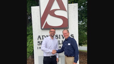 Jan Schulz-Wachler, president of Eukalin Corporation, with Steve Russo, president of Adhesives Specialists Inc.