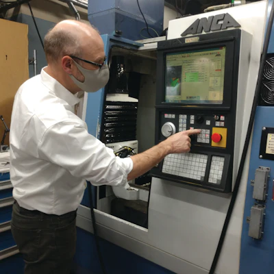 Bh Jim Biel Working A Machine
