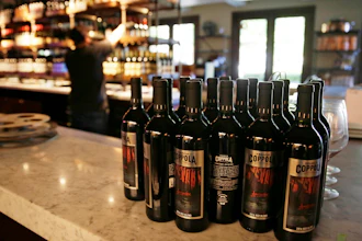 Bottles of Apocalypse Now Red Blend wine on a counter at the Francis Ford Coppola Winery, Geyserville, Calif., May 21, 2020.