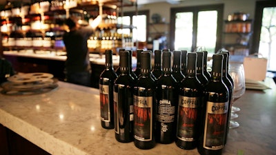 Bottles of Apocalypse Now Red Blend wine on a counter at the Francis Ford Coppola Winery, Geyserville, Calif., May 21, 2020.