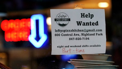 Hiring sign at a restaurant in Highland Park, Ill., July 14, 2022.