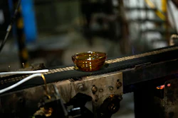 A bowl is manufactured in the factory of the French glassmaker Duralex, in La Chapelle Saint-Mesmin, central France, Wednesday, Sept. 7, 2022. Iconic French tableware brand Duralex is joining a growing array of European firms that are reducing and halting production because of soaring energy costs.