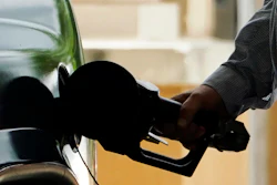 A customer pumps gas at a Sam's Club location in Madison, Miss., May 24, 2022.