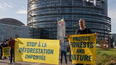 Greenpeace activists protest against deforestation outside the European Parliament, Strasbourg, France, Sept. 13, 2022.