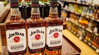 Shelves display bottles of bourbons for sale at a Pennsylvania fine wine and spirits store, Saturday, Jan. 22, 2022, in Harmony, Pa.