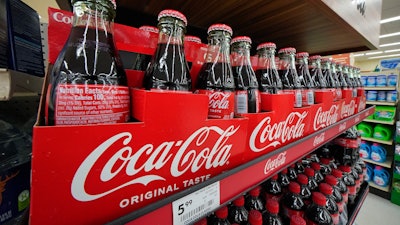 Bottles of Coca-Cola displayed at a grocery store in Uniontown, Pa., April 24, 2022.