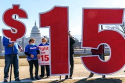Activists appeal for a $15 minimum wage near the Capitol in Washington, Thursday, Feb. 25, 2021. According to the Economic Policy Institute, the federal minimum wage in 2021 was worth 34% less than in 1968, when its purchasing power peaked.