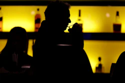 A patron sips a drink at a bar in New Jersey, Nov. 30, 2017.
