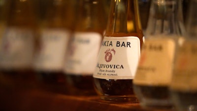 Bottles of sljivovica at a bar in Belgrade, Serbia, Nov. 11, 2022.