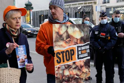 French animal rights activists group L214 protests in front of Agriculture Ministry in Paris, Dec. 7, 2022.