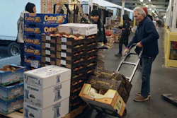 People shop for fruits and vegetables at S. Katzman Produce, Hunts Point Produce Market, the Bronx, Nov. 22, 2022.