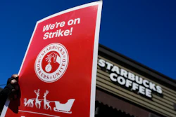 Starbucks employees strike outside their store in Mesa, Ariz., Nov. 17, 2022.