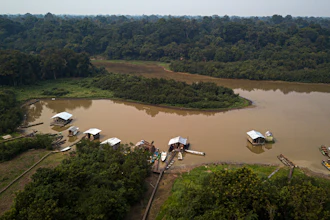 Floating warehouses in the Sao Raimundo settlement, Brazil, Sept. 5, 2022.