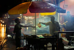 A street vendor sells food in Colombo, Sri Lanka, Dec. 28, 2022.