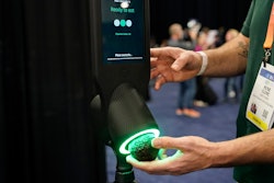 An exhibitor demonstrates the OneThird avocado ripeness checker during CES Unveiled before the start of the CES tech show, Tuesday, Jan. 3, 2023, in Las Vegas.