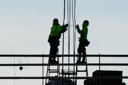 Construction workers on a building in Philadelphia, Dec. 21, 2022.