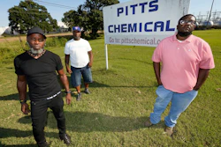 Richard Strong, left, his brother Gregory Strong, center, and Stacy Griffin pose for a photo on Sept. 9, 2021, in Indianola, Miss.