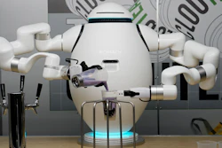An ADAM beverage robot makes boba tea at the Richtech Robotics booth during the CES tech show, Jan. 6, 2023, Las Vegas.