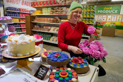 Robin Frohardt, creator of the Plastic Bag Store, holds plastic bag roses at the art installation, Jan. 17, 2023, Ann Arbor, Mich.