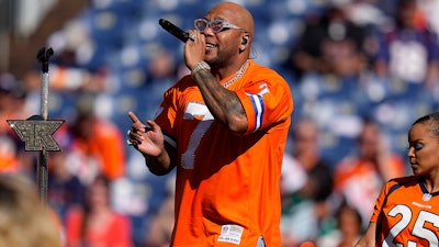 Singer Flo Rida performs at halftime during of an NFL football game between the New York Jets and the Denver Broncos, Sept. 26, 2021, Denver.