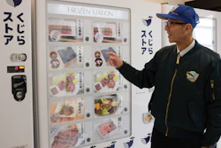 Konomu Kubo, a spokesperson for Kyodo Senpaku Co., explains how whale meat is being sold from a vending machine, Yokohama, Japan, Jan. 26, 2023.