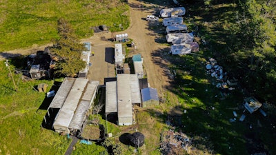 A drone photo of mobile homes at the California Terra Garden, formerly Mountain Mushroom Farm, in Half Moon Bay, Calif., Jan. 26, 2023.