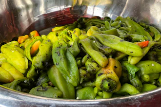 A bowl of roasted green chile at a market in Hatch, N.M., July 12, 2021.